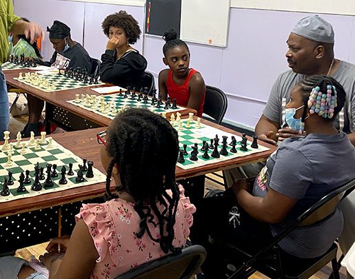 Kids learning chess